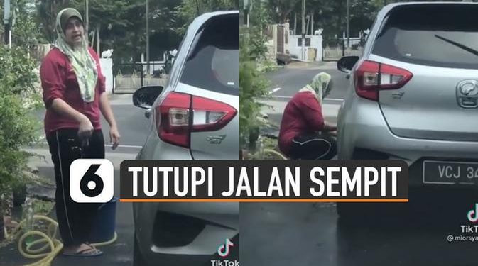 VIDEO: Duh, Wanita Ini Tutupi Jalan Sempit Untuk Cuci Mobil
