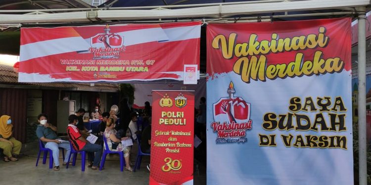 Gelar Vaksinasi Merdeka, Milenial Merah Putih Beri Undian Liburan ke Labuan Bajo
