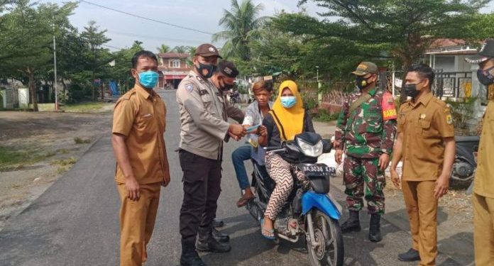 Polsek Tanjung Beringin Gelar Operasi Yustisi Terapkan Prokes dan PPKM Mikro