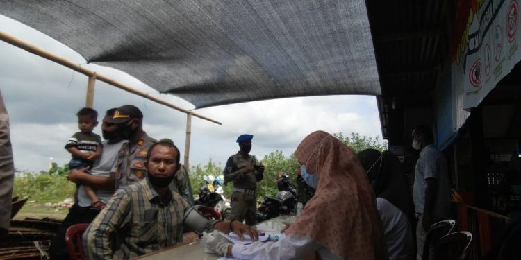 Tim Yustisi Masuk Pasar, Terapkan Penegakan Prokes dan Vaksinasi