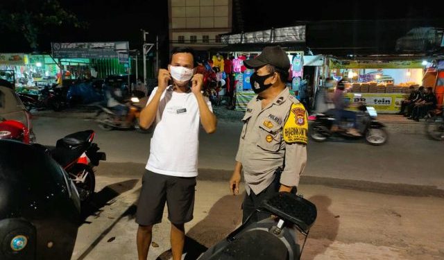 Bhabinkamtibmas Polsek Bontang Selatan Berikan Himbauan Prokes